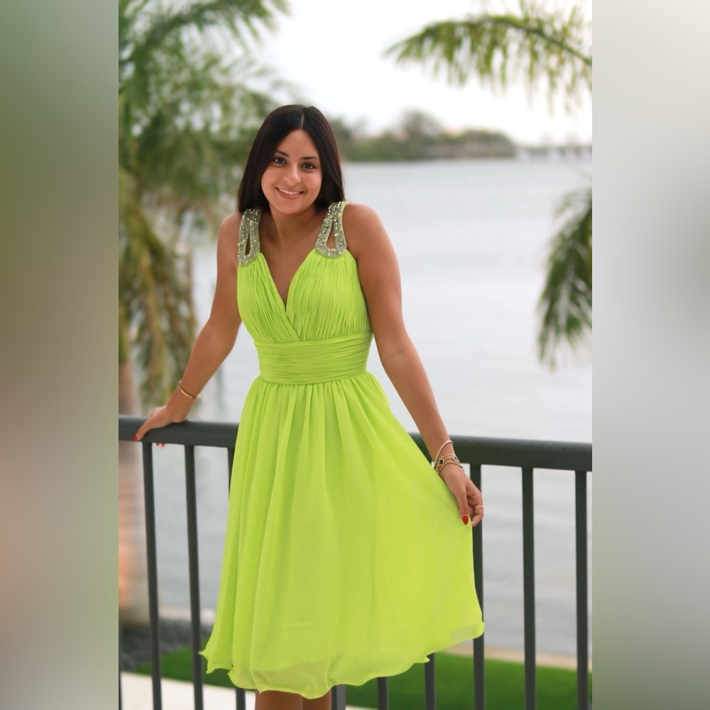 Fun flirty V neck dress with fully beaded accenting